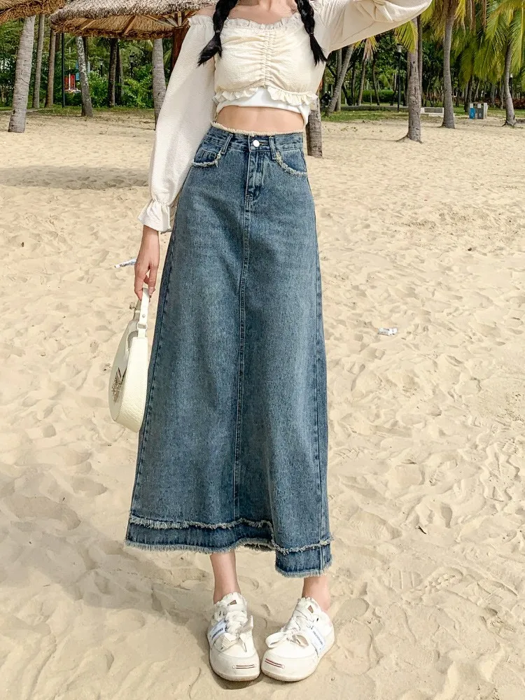 GUUZYUVIZ Трапециевидная винтажная джинсовая юбка для женщин, Повседневная летняя длинная юбка с высокой талией для женщин
GUUZYUVIZ Трапециевидная винтажная джинсовая юбка для женщин, Повседневная летняя длинная юбка с высокой талией для женщин