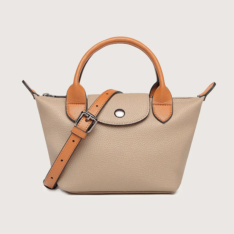 Classic dumpling bag hand-held color matching cowhide bag 2022 new one shoulder real leather bag fashion versatile messenger wom
Classic dumpling bag hand-held color matching cowhide bag 2022 new one shoulder real leather bag fashion versatile messenger wom