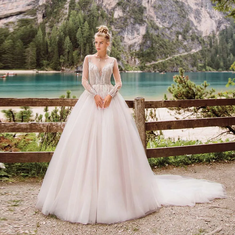 Exquisite Bridal Gowns 2022 New Glitter Beaded Sequins V-Neck Bride Dress Long Sleeve Illusion Tulle Lace Button Wedding Dress
Exquisite Bridal Gowns 2022 New Glitter Beaded Sequins V-Neck Bride Dress Long Sleeve Illusion Tulle Lace Button Wedding Dress