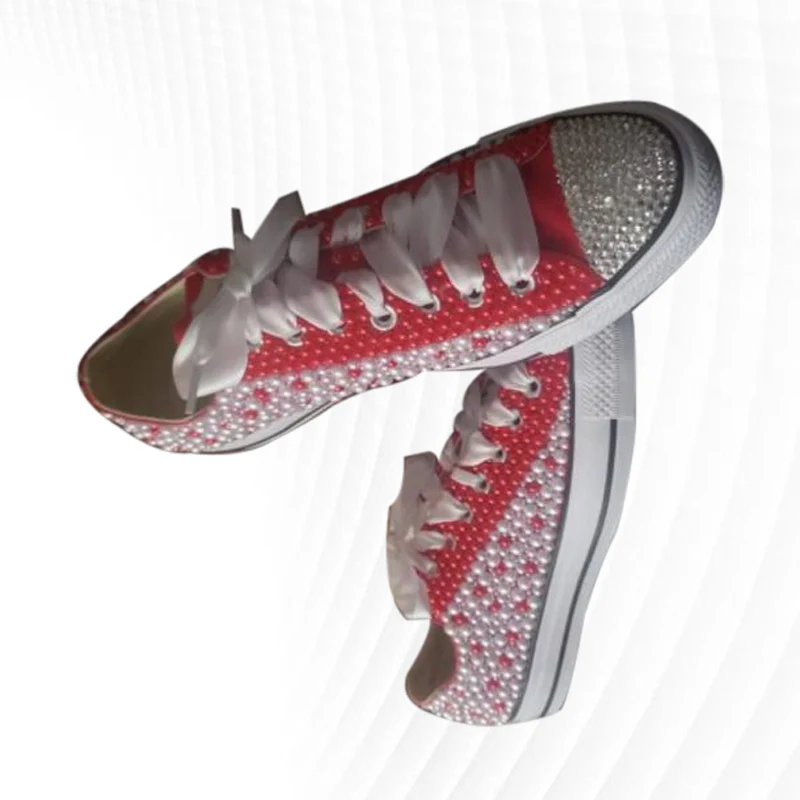 Red and white stitching pearl white ribbon low-top canvas shoes fashion street shooting handmade pearl vulcanized shoes 35-46
Red and white stitching pearl white ribbon low-top canvas shoes fashion street shooting handmade pearl vulcanized shoes 35-46