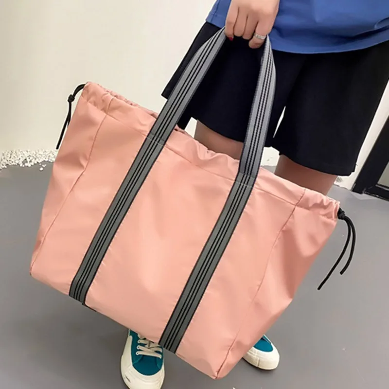 New Fashion Travel Bag Sport Drawstring Gym Bag Multifunctional Handbag Waterproof Shoulder Bag Female High Capacity Backpack
New Fashion Travel Bag Sport Drawstring Gym Bag Multifunctional Handbag Waterproof Shoulder Bag Female High Capacity Backpack