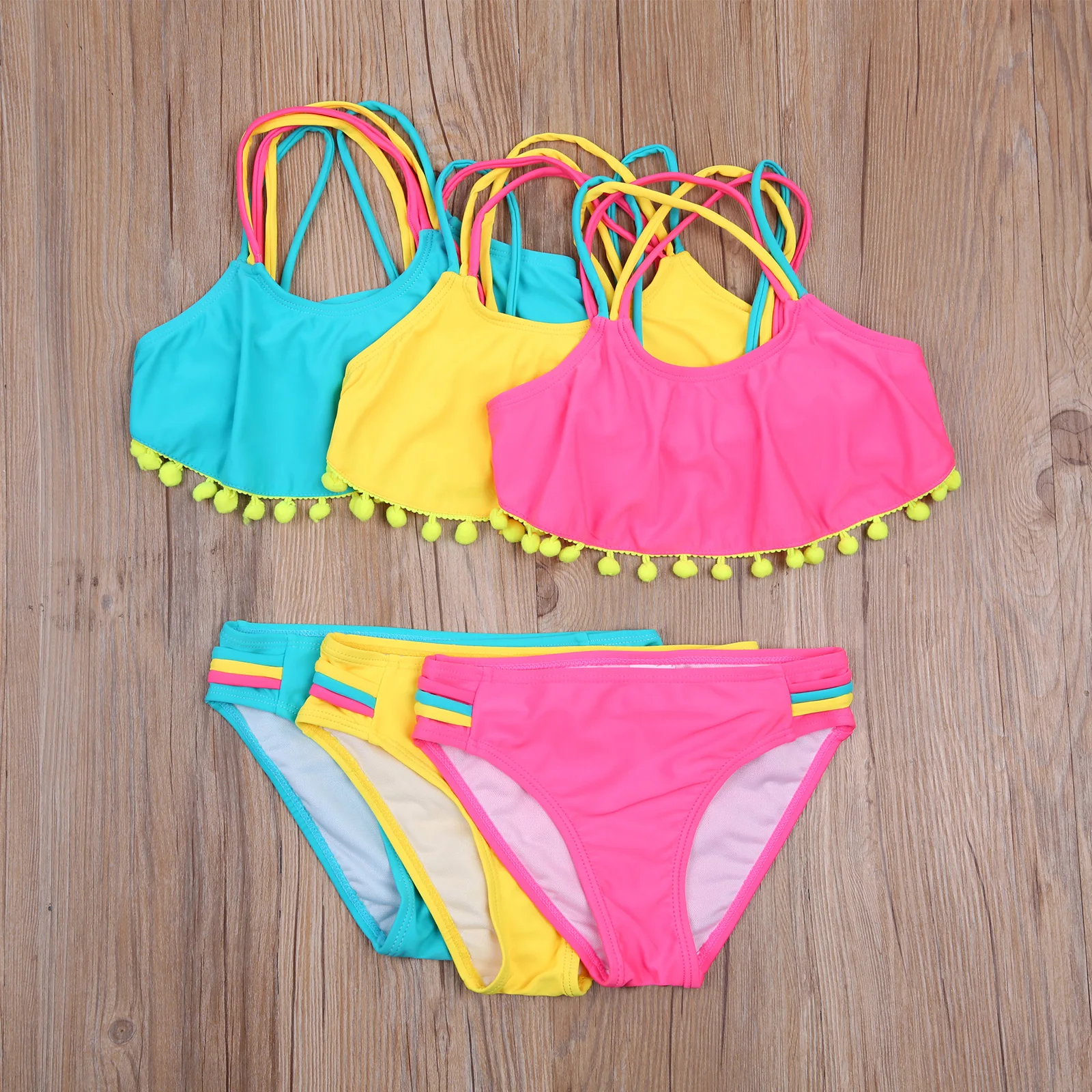 Summer Children Girls Bikinis Set Sleeveless Backless swimsuit with Ball Tassel + Panties Summer Bathing Suit for 3-12Years
Summer Children Girls Bikinis Set Sleeveless Backless swimsuit with Ball Tassel + Panties Summer Bathing Suit for 3-12Years