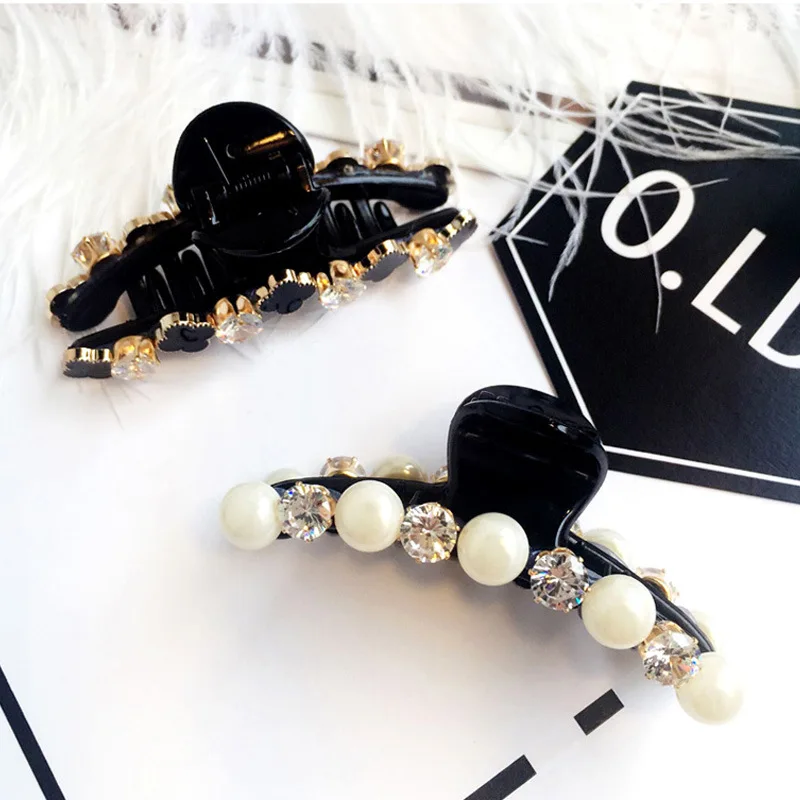 Korean Version Of The New Pearl Grip Clip Fashion Girl Clover Rhinestone Zircon Large Grip Clip Resin Headdress Hairpin 
Korean Version Of The New Pearl Grip Clip Fashion Girl Clover Rhinestone Zircon Large Grip Clip Resin Headdress Hairpin