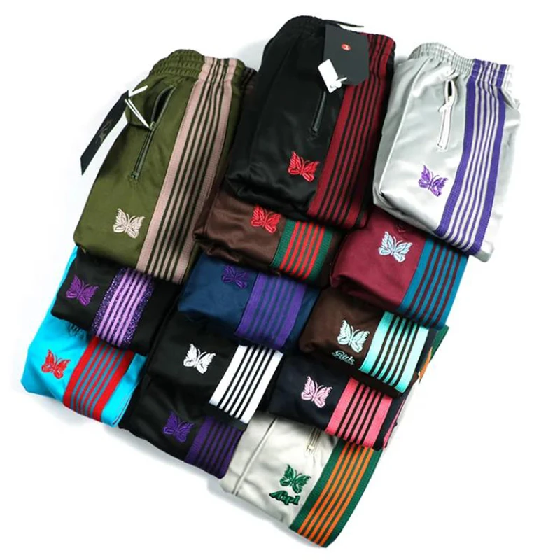Fashion Streetwear AWGE Needles Sweatpants Women Men Striped Zipper AWGE Pants Butterfly Embroidery Joggers Needles Trousers
Fashion Streetwear AWGE Needles Sweatpants Women Men Striped Zipper AWGE Pants Butterfly Embroidery Joggers Needles Trousers