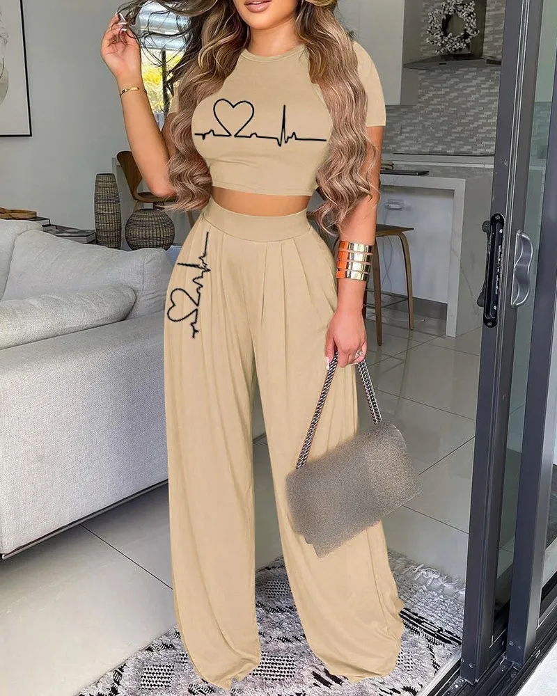 2022 Summer Ladies Two Piece Fashion Print Short Sleeve Sexy Cropped Navel Body Top Wide Leg Pants Casual Elegant Suit 2 Piece
2022 Summer Ladies Two Piece Fashion Print Short Sleeve Sexy Cropped Navel Body Top Wide Leg Pants Casual Elegant Suit 2 Piece