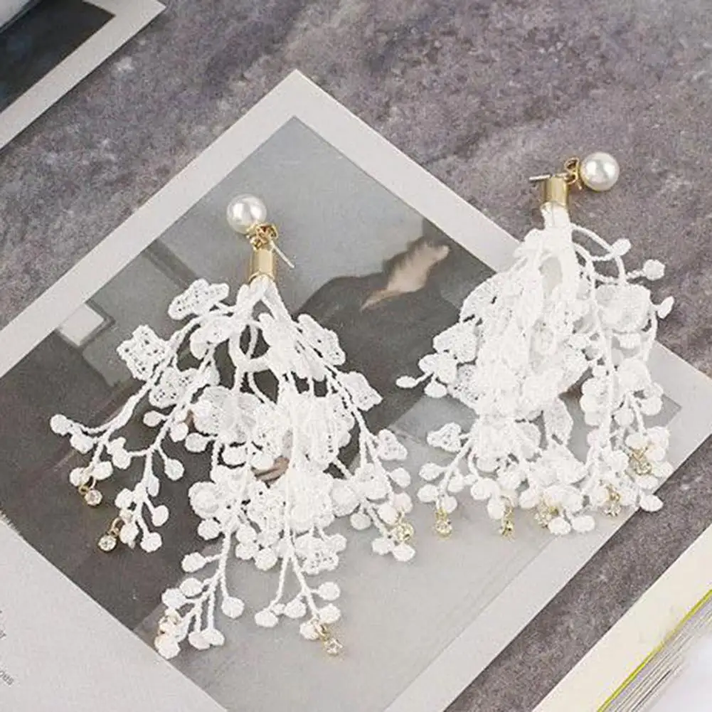 Tassel Earrings Eye-catching Alloy Multi-Layer Flower Bohemian Style Faux Pearl Ear Studs Glittery Drop Earrings for Party
Tassel Earrings Eye-catching Alloy Multi-Layer Flower Bohemian Style Faux Pearl Ear Studs Glittery Drop Earrings for Party