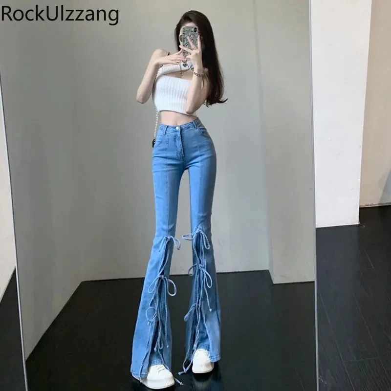Женские джинсы со шнуровкой, расклешенные брюки с бантом и разрезом, джинсовые брюки в стиле Хай-стрит, облегающая Корейская одежда y2k
Женские джинсы со шнуровкой, расклешенные брюки с бантом и разрезом, джинсовые брюки в стиле Хай-стрит, облегающая Корейская одежда y2k