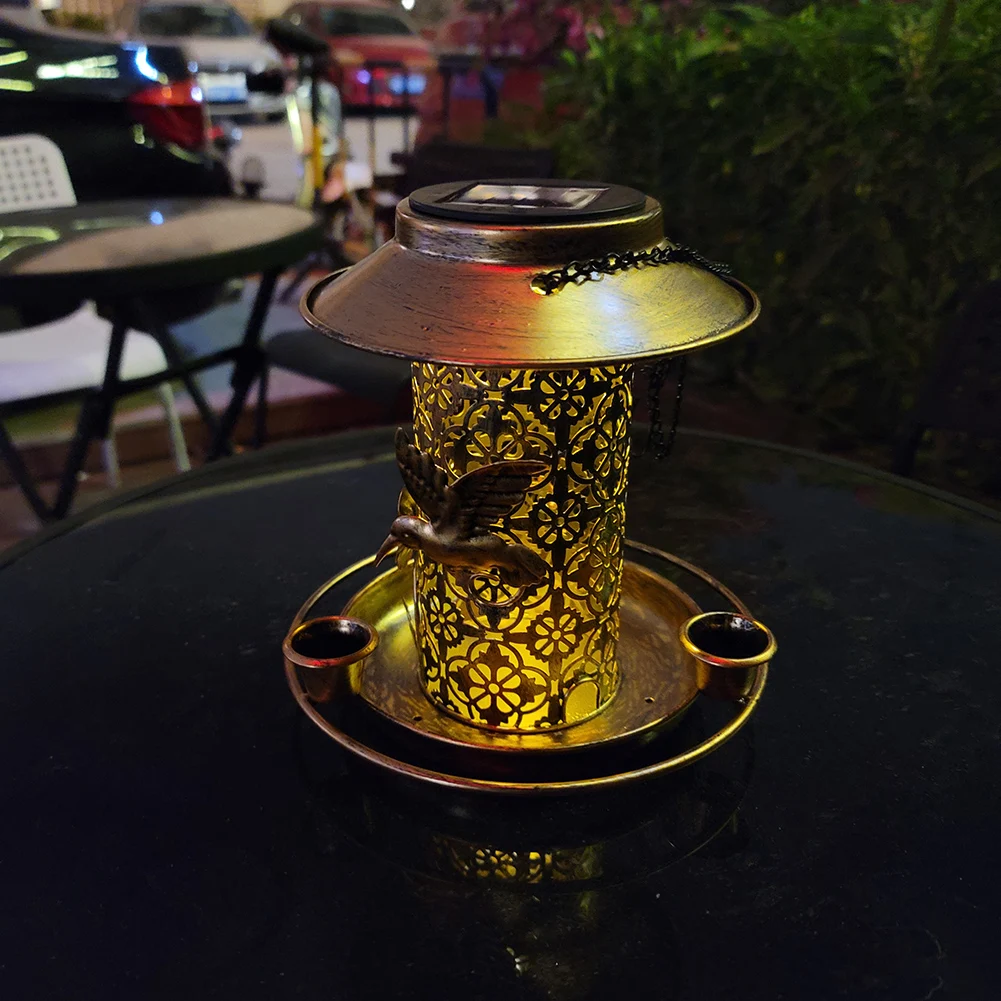 New Solar Bird Feeder Metal Hanging Humming Bird Feeder Bird House with LED Lights for Garden Yard Outdoor Decoration Crafts
New Solar Bird Feeder Metal Hanging Humming Bird Feeder Bird House with LED Lights for Garden Yard Outdoor Decoration Crafts
