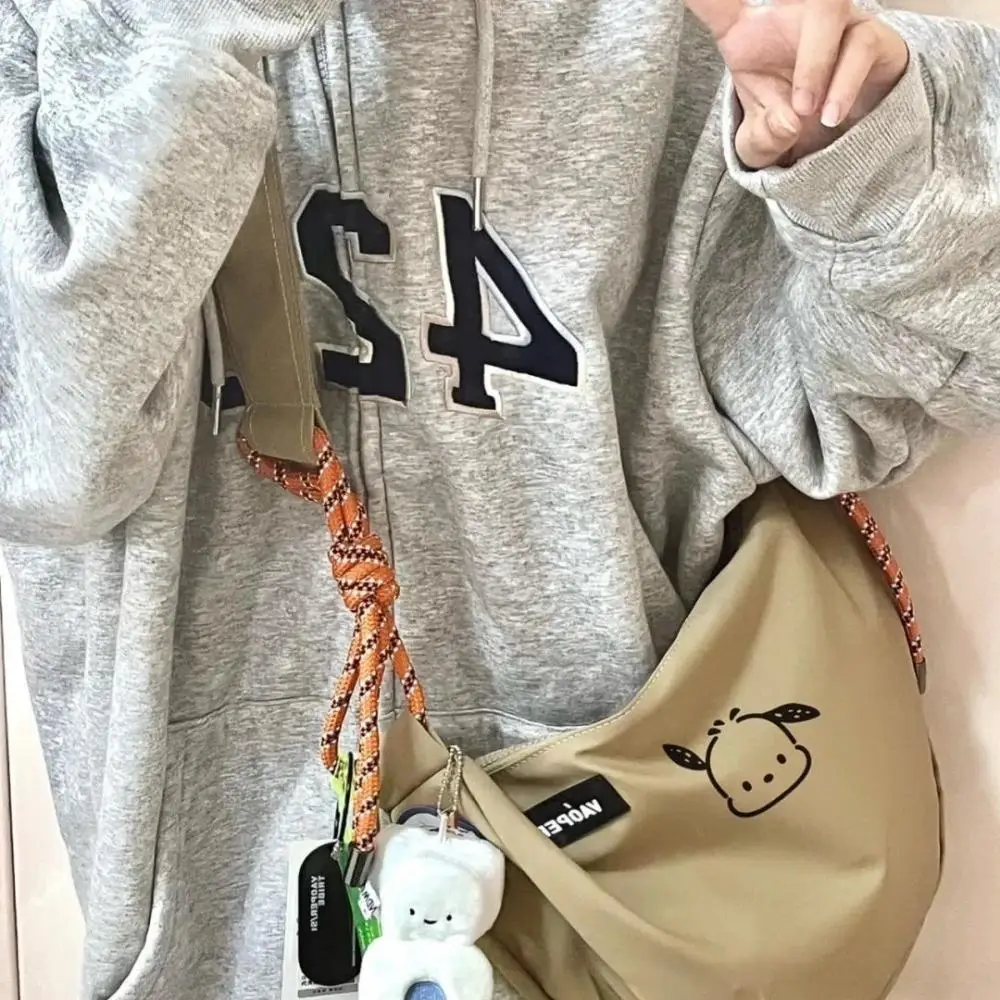 Kawaii Sanrios Accessories Pochacco Messenger Bag Cute Cartoon Men and Women Shoulder Bag Sports Large Capacity Backpack Gift
Kawaii Sanrios Accessories Pochacco Messenger Bag Cute Cartoon Men and Women Shoulder Bag Sports Large Capacity Backpack Gift