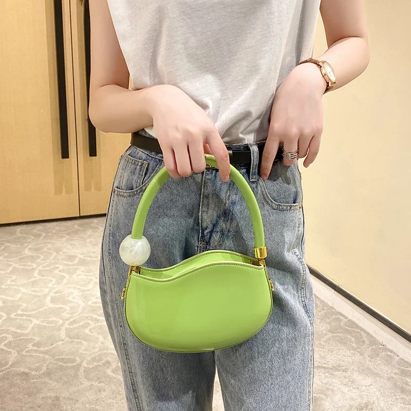 2022 New Premium Quality Women's Handbag Fashion Pea Handbag Compact Enamelled Leather Phone Bag Female Cosmetic Bag
2022 New Premium Quality Women's Handbag Fashion Pea Handbag Compact Enamelled Leather Phone Bag Female Cosmetic Bag