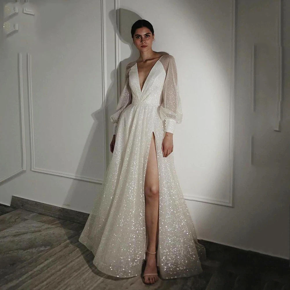 Gorgeous Glittering Bride Dresses Sexy Deep V-Neck Mermaid Long Sleeve Side High Split Pleated Wedding Formal Beach Party Gowns
Gorgeous Glittering Bride Dresses Sexy Deep V-Neck Mermaid Long Sleeve Side High Split Pleated Wedding Formal Beach Party Gowns