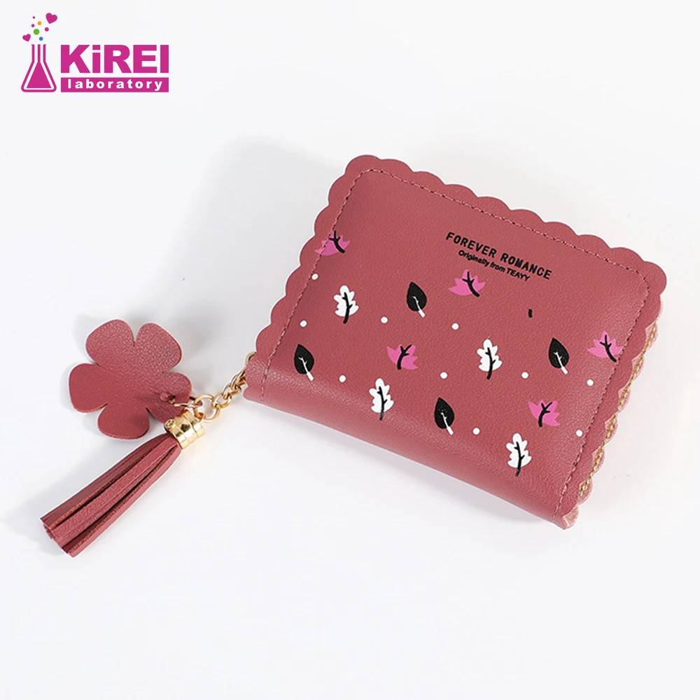 Ladies short fashion two compartment separation student model maple leaf bayonet portable wallet change storage card bag
Ladies short fashion two compartment separation student model maple leaf bayonet portable wallet change storage card bag