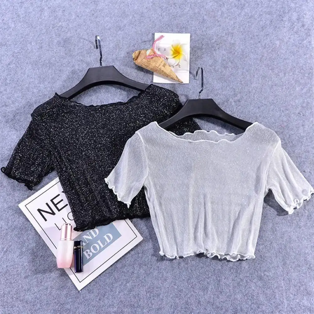 Кроп-топ женский прозрачный с круглым вырезом и коротким рукавом
Кроп-топ женский прозрачный с круглым вырезом и коротким рукавом