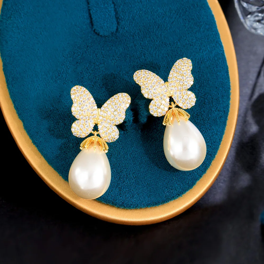 ThreeGraces Cute Sparkly Butterfly Shaped Cubic Zirconia Simulated Pearl Drop Earrings for Women Brazilian Daily Jewelry E1107
ThreeGraces Cute Sparkly Butterfly Shaped Cubic Zirconia Simulated Pearl Drop Earrings for Women Brazilian Daily Jewelry E1107