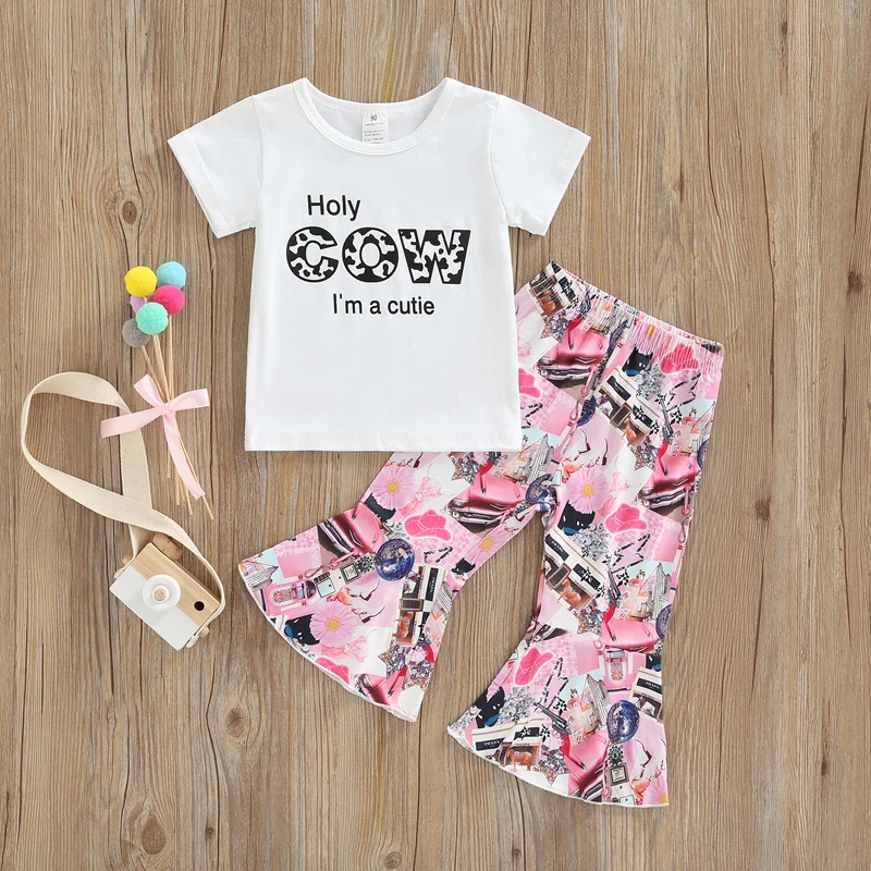 Baby Kid Girls Pants Set Short Sleeve Letters Print T-shirt with Elastic Waist Flare Pants Casual Outfit 
Baby Kid Girls Pants Set Short Sleeve Letters Print T-shirt with Elastic Waist Flare Pants Casual Outfit