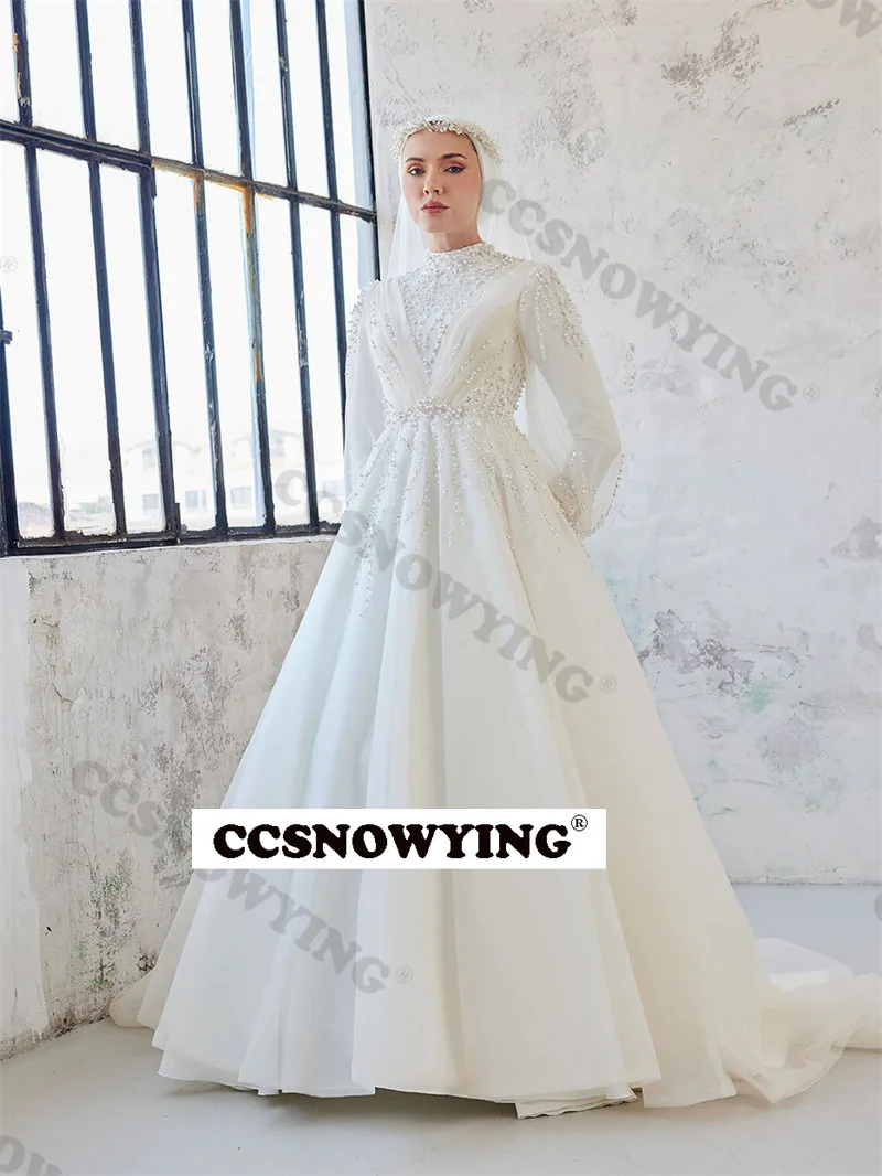 Organza Appliques Pearls Muslim Wedding Dress for Bride Dubai Arabic Long Sleeve Bridal Gown Hijab Robe De Soirée De Mariage
Organza Appliques Pearls Muslim Wedding Dress for Bride Dubai Arabic Long Sleeve Bridal Gown Hijab Robe De Soirée De Mariage