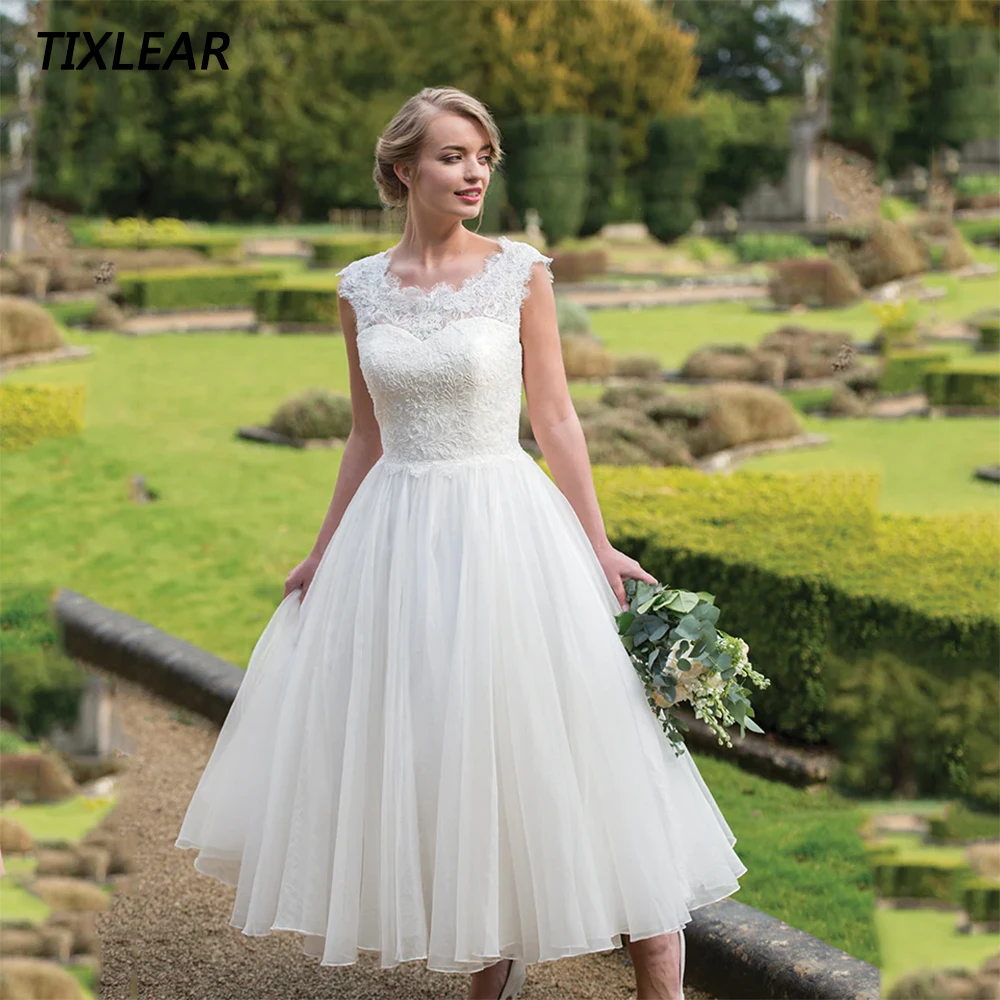 TIXLEAR Elegant Short Wedding Dresses Simple O-Neck Sleeveless Lace Appliques Backless Button Bridal Gown Vestidos De Novia New 
TIXLEAR Elegant Short Wedding Dresses Simple O-Neck Sleeveless Lace Appliques Backless Button Bridal Gown Vestidos De Novia New