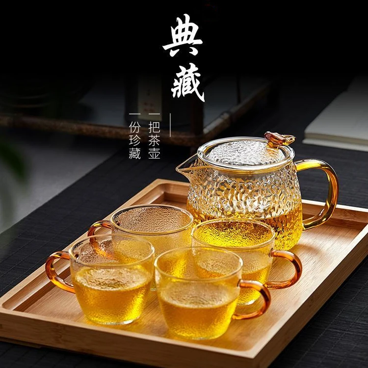 Japanese hammer high temperature resistant glass teapot filter Retro Tea Maker transparent belt handle glass kungfu tea set
Japanese hammer high temperature resistant glass teapot filter Retro Tea Maker transparent belt handle glass kungfu tea set
