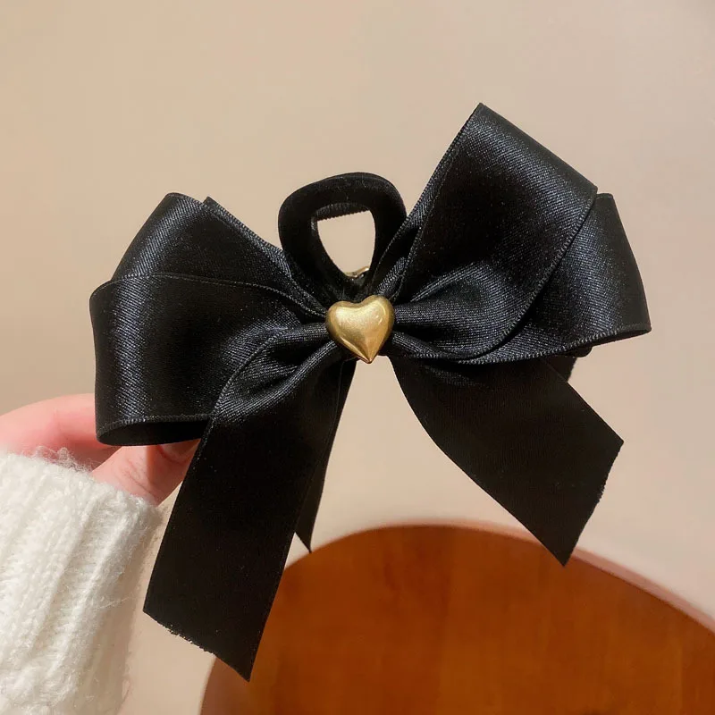 Корейские элегантные черные заколки для волос с бантом для женщин, большая зажим для волос с тыльной стороны, заколка для волос с акулой, гол... 
Корейские элегантные черные заколки для волос с бантом для женщин, большая зажим для волос с тыльной стороны, заколка для волос с акулой, гол...