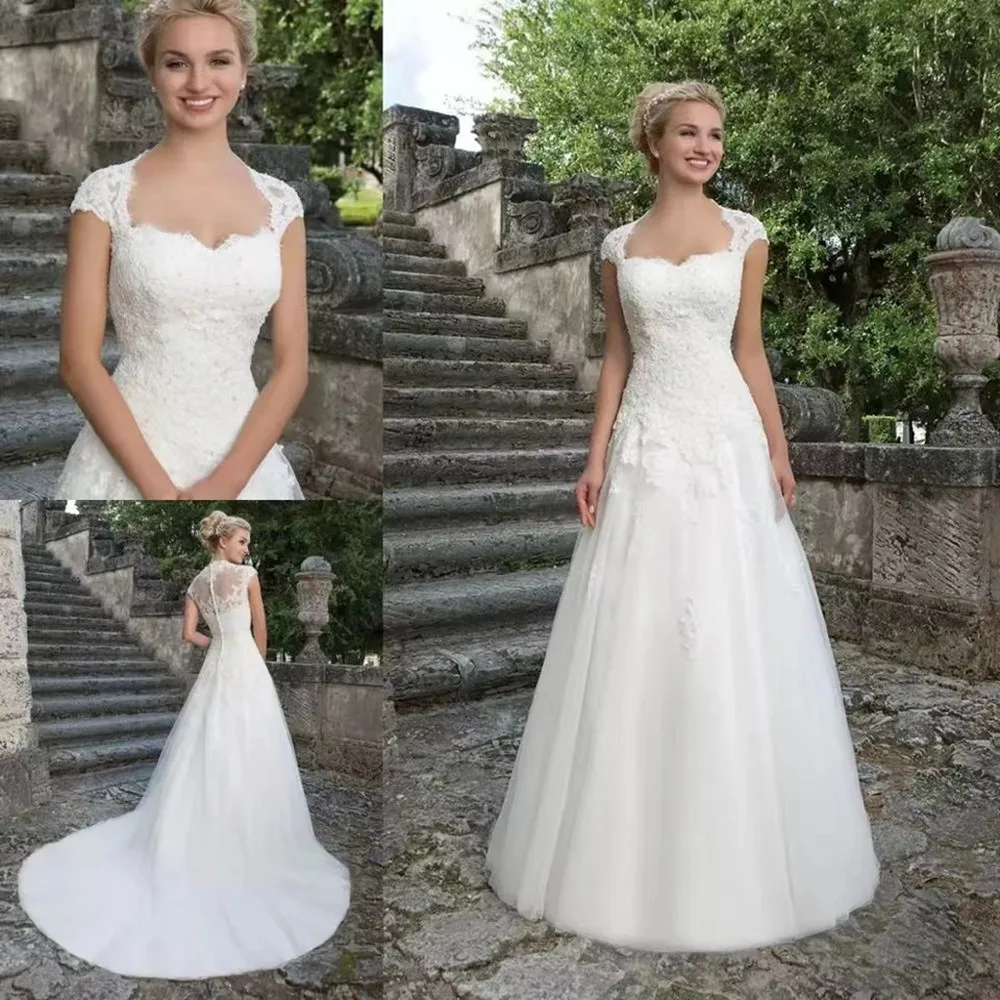 Elegant Wedding Dresses Cap Sleeve Royal Square Neck Robe De Mariée Bride Gown Vestido de Noiva Beaded Appliques Tulle New
Elegant Wedding Dresses Cap Sleeve Royal Square Neck Robe De Mariée Bride Gown Vestido de Noiva Beaded Appliques Tulle New