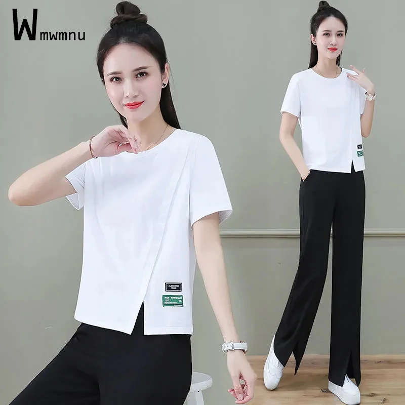 Summer Women Solid Slit Black Wide Leg Pants+O Neck T-shirt Tracksuits trainingspak tailleur femme pantalon et veste elegant
Summer Women Solid Slit Black Wide Leg Pants+O Neck T-shirt Tracksuits trainingspak tailleur femme pantalon et veste elegant