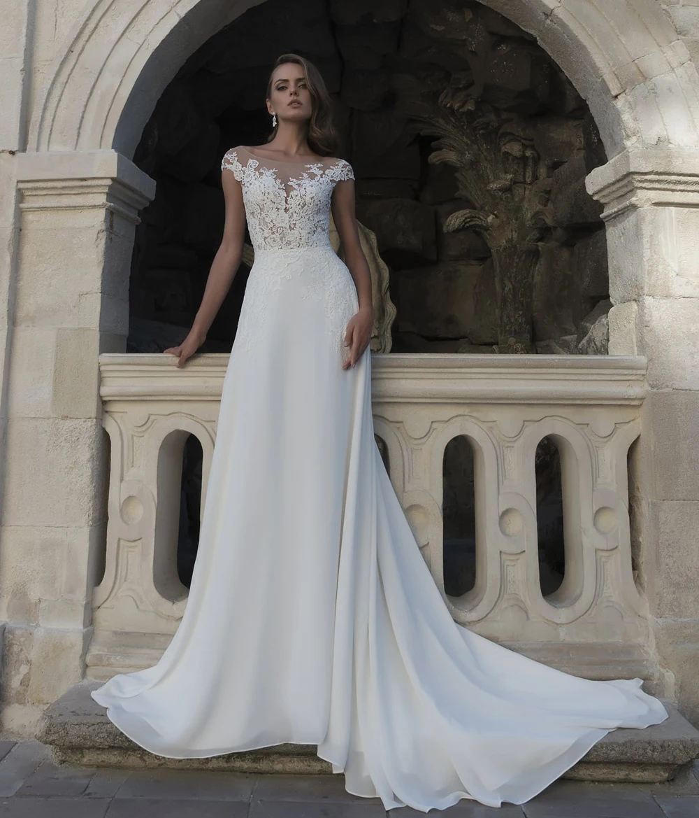 Exquisite Boho Wedding Dress Sexy Back Scoop Cap Sleeves Beach Bride Dress Bohemian Bridal Gown Robe de Mairee
Exquisite Boho Wedding Dress Sexy Back Scoop Cap Sleeves Beach Bride Dress Bohemian Bridal Gown Robe de Mairee