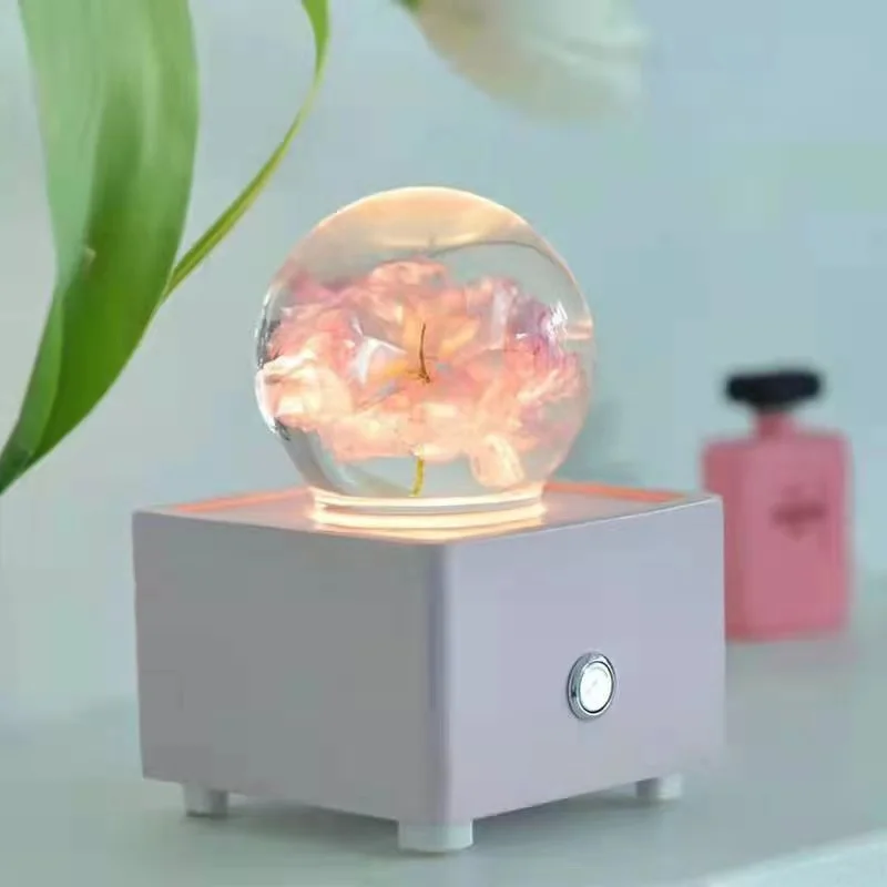 Resin crystal ball crafts Christmas ornaments double pink cherry blossom bluetooth speaker
Resin crystal ball crafts Christmas ornaments double pink cherry blossom bluetooth speaker