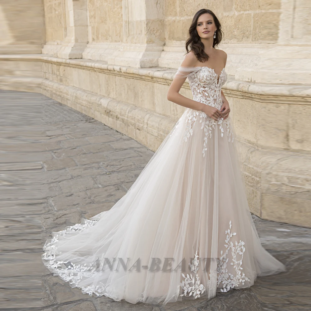 Anna Wedding Dresses Princess V Neck Illusion Appliques Off The Shoulder Tulle Sweep Train Illusion With Button Personalised
Anna Wedding Dresses Princess V Neck Illusion Appliques Off The Shoulder Tulle Sweep Train Illusion With Button Personalised