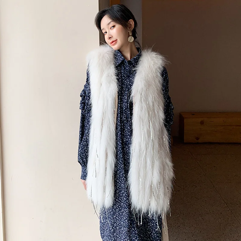 Raccoon dog Fur Coat Autumn and Winter Fashion Casual Stripe Tassel Sequins Women's Vest Waistcoat Medium Long Real Fur Jacket
Raccoon dog Fur Coat Autumn and Winter Fashion Casual Stripe Tassel Sequins Women's Vest Waistcoat Medium Long Real Fur Jacket
