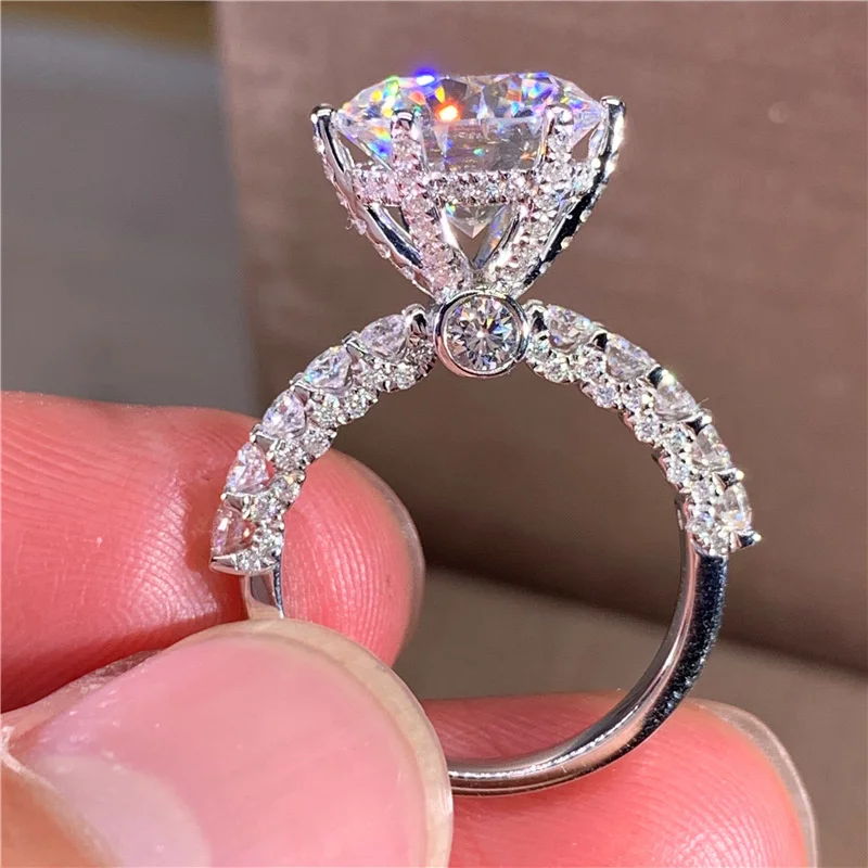 Six claw Mossan diamond ring female 18K White Gold au750 Mossan stone ring luxury inlaid with full diamond 2/3/5 carat female
Six claw Mossan diamond ring female 18K White Gold au750 Mossan stone ring luxury inlaid with full diamond 2/3/5 carat female