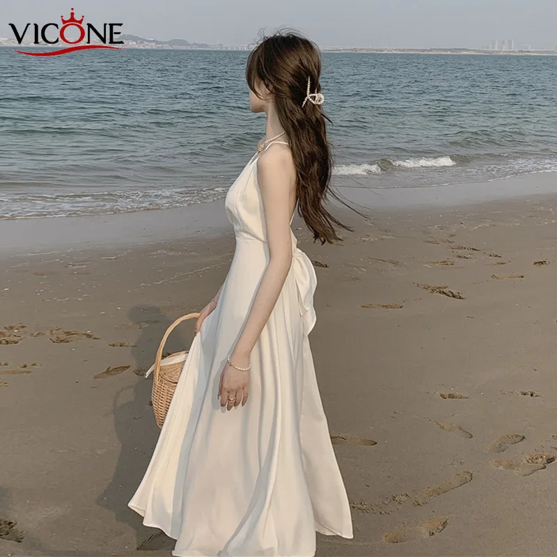 Maxi Vintage Satin Sexy White Sleeveless Summer Dress Women Vacation Robe Backless Bow Beach Long Sundress 2022 New Arrival 
Maxi Vintage Satin Sexy White Sleeveless Summer Dress Women Vacation Robe Backless Bow Beach Long Sundress 2022 New Arrival