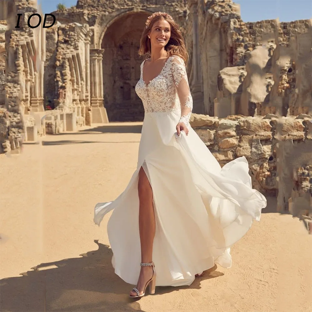 I OD Elegant V-Neck Wedding Dress Side Slit Long Sleeves Lace Appliques Illusion Button Chiffon Bridal Gown Floor Length Vestido
I OD Elegant V-Neck Wedding Dress Side Slit Long Sleeves Lace Appliques Illusion Button Chiffon Bridal Gown Floor Length Vestido