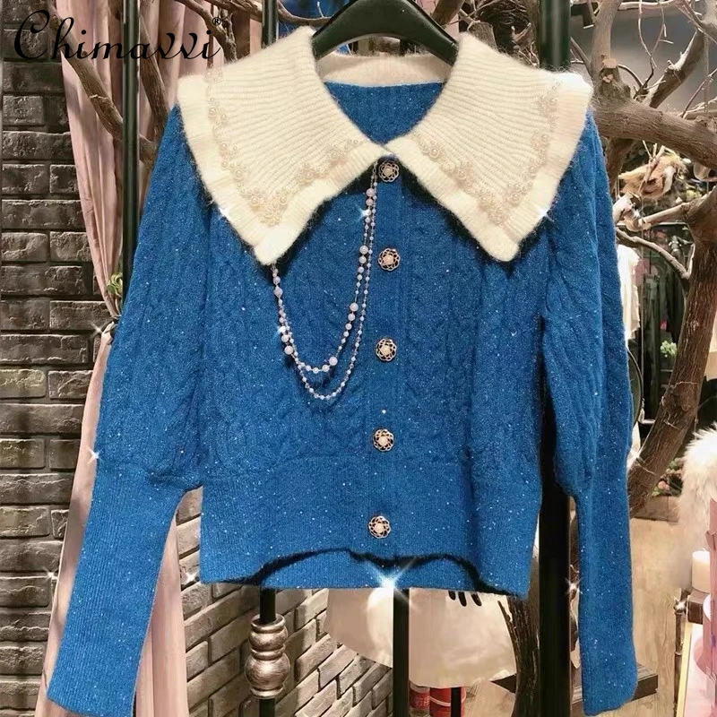 2022 New Winter Clothes Fashion Blue Doll Collar Handmade Beaded Puff Sleeve Sweater Slim Short Temperamental Knitted Cardigan
2022 New Winter Clothes Fashion Blue Doll Collar Handmade Beaded Puff Sleeve Sweater Slim Short Temperamental Knitted Cardigan