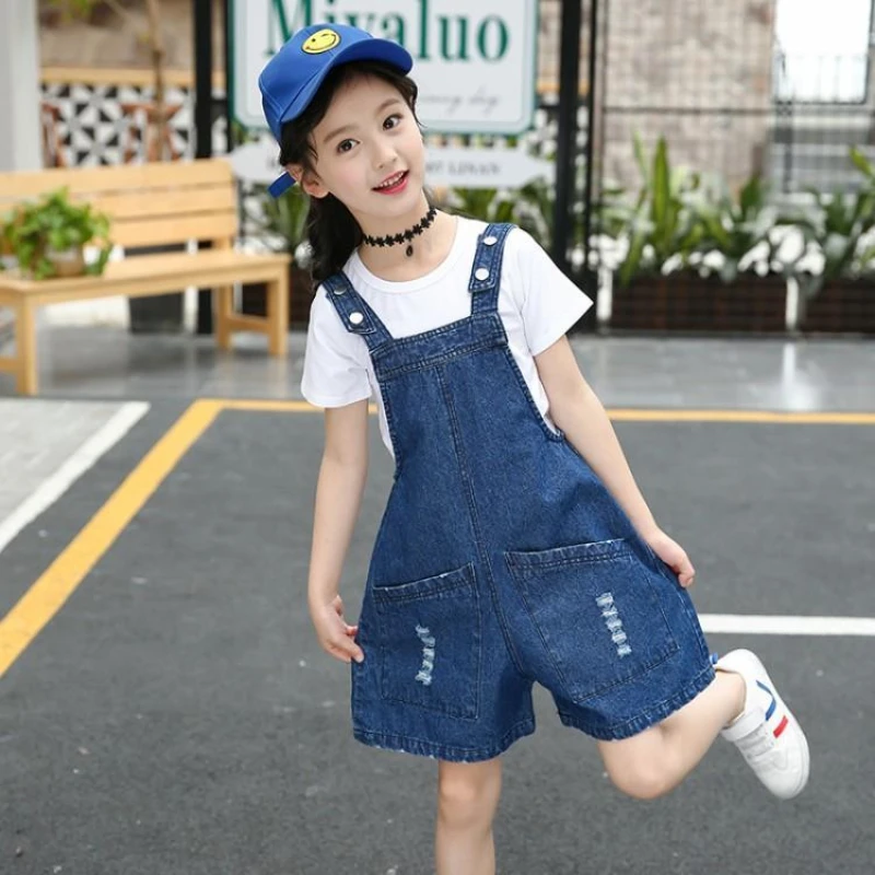 Summer Casual Short Jeans Kids Shorts Girls Overalls Solid Color Denim Suspender Pants Knee-Length Teen Girl Wide-Leg Jumpsuits
Summer Casual Short Jeans Kids Shorts Girls Overalls Solid Color Denim Suspender Pants Knee-Length Teen Girl Wide-Leg Jumpsuits