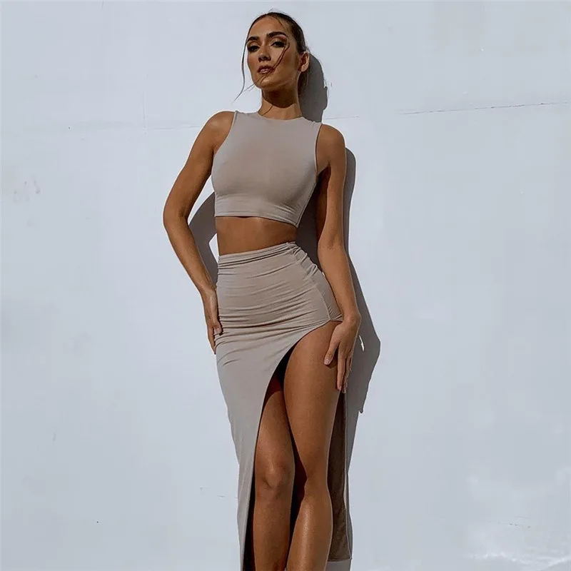 Summer Solid Slim Two Pieces Set Women Casual Sexy Knitted Sleeveless O Neck Tank Top and High Waist Split Long Skirt Suits 2022
Summer Solid Slim Two Pieces Set Women Casual Sexy Knitted Sleeveless O Neck Tank Top and High Waist Split Long Skirt Suits 2022