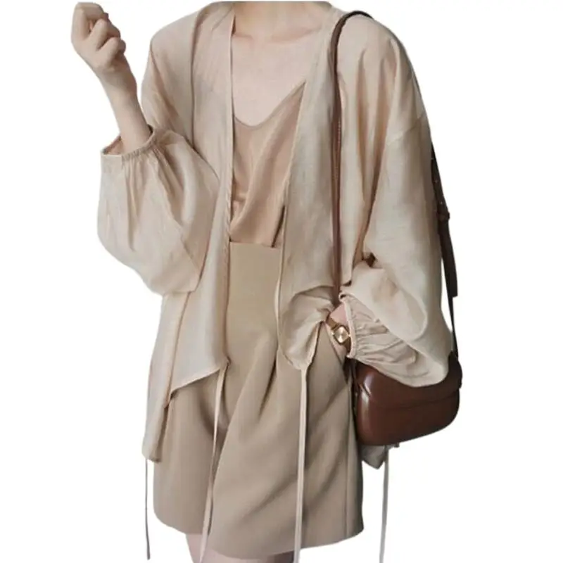 Summer Femal Casual Loose Front Lace Up Cardigan Thin Transparent Blouses Women Long Sleeve Coat Sunscreen Shirt White Shirt
Summer Femal Casual Loose Front Lace Up Cardigan Thin Transparent Blouses Women Long Sleeve Coat Sunscreen Shirt White Shirt