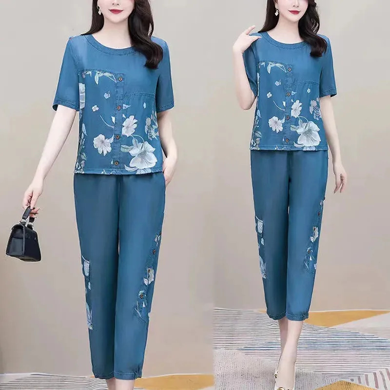 2022 New Summer Splicing Casual Denim Sets Female T-Shirt Loose Elastic Waist Jeans Suit Mother Two-Piece Suit High Quality
2022 New Summer Splicing Casual Denim Sets Female T-Shirt Loose Elastic Waist Jeans Suit Mother Two-Piece Suit High Quality