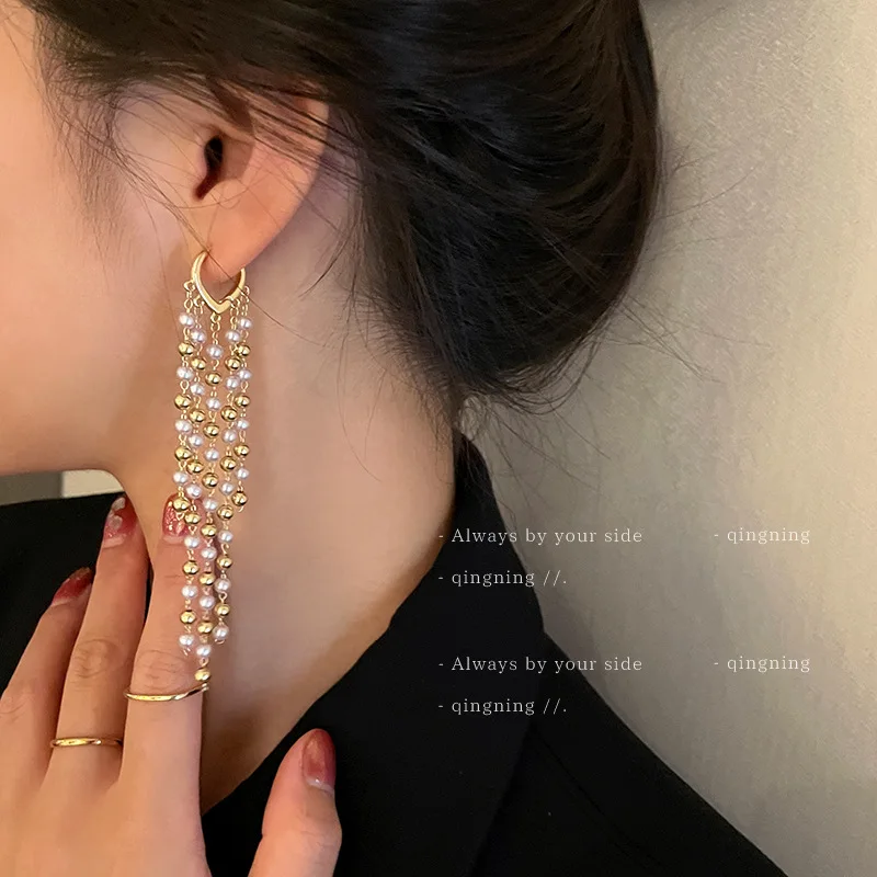 Korean Pearl Long Tassel Earrings Design Sense Simple Lady Fan Fashion Buckle Elegant All Matching Earrings Women
Korean Pearl Long Tassel Earrings Design Sense Simple Lady Fan Fashion Buckle Elegant All Matching Earrings Women