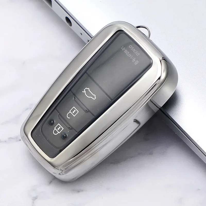 Чехол для автомобильного ключа из ТПУ для Toyota Rav4 2021 Hybryd Camry 70 2020 Prado Corolla Sedan 2019, держатель для ключа с 3 кнопками, аксессуары в виде ракушки
Чехол для автомобильного ключа из ТПУ для Toyota Rav4 2021 Hybryd Camry 70 2020 Prado Corolla Sedan 2019, держатель для ключа с 3 кнопками, аксессуары в виде ракушки