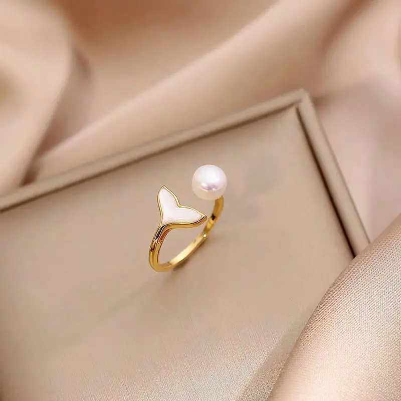 Dolphin Mermaid Tail Natural Freshwater Pearl Ring Female Opening 925 Silver Fashion Personality Niche Original Design
Dolphin Mermaid Tail Natural Freshwater Pearl Ring Female Opening 925 Silver Fashion Personality Niche Original Design