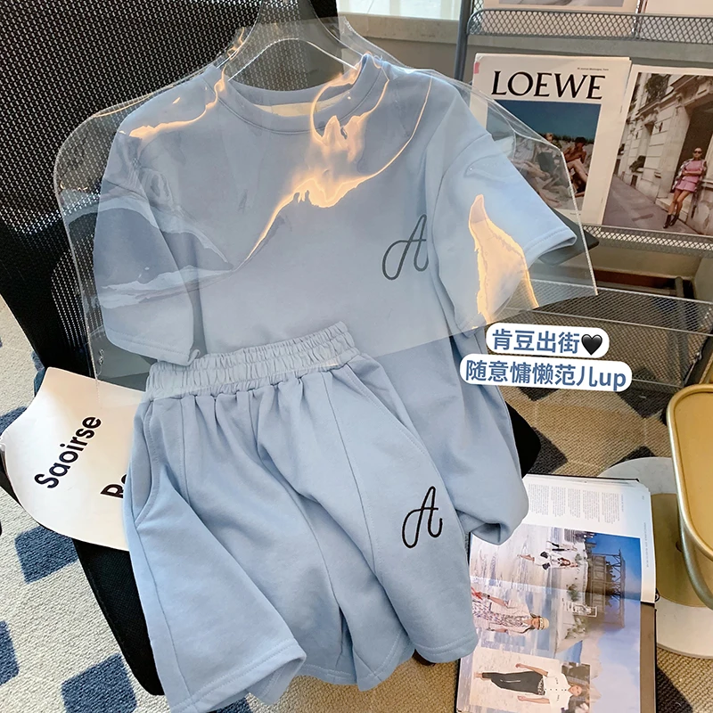 Women's Blue Casual Sports Suit Round Neck Short Sleeve Tops Shorts Two Piece Set Korean Fashion Baggy Ladies Suit Summer
Women's Blue Casual Sports Suit Round Neck Short Sleeve Tops Shorts Two Piece Set Korean Fashion Baggy Ladies Suit Summer