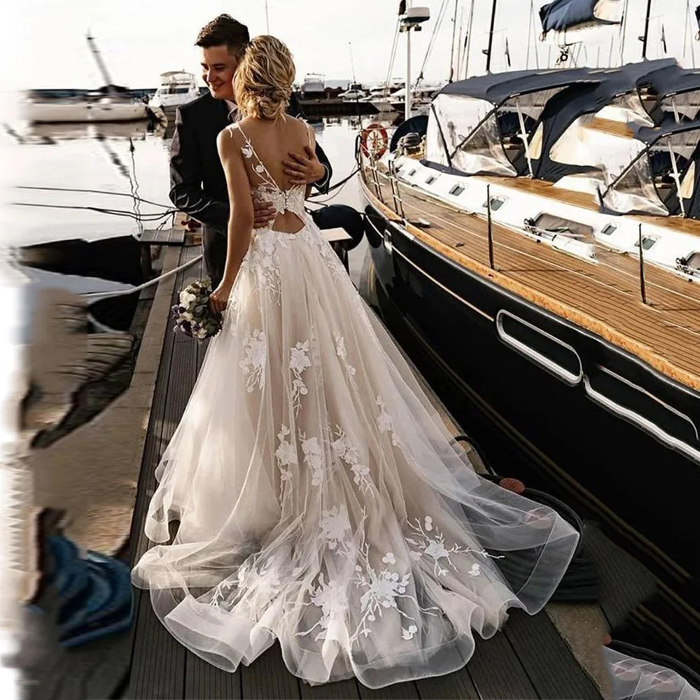Summer Wedding Dress A Line Bateau Flower Applique Illusion Wedding Gown Sleeveless Sweep Train Backless Sexy Bridal Dresses
Summer Wedding Dress A Line Bateau Flower Applique Illusion Wedding Gown Sleeveless Sweep Train Backless Sexy Bridal Dresses