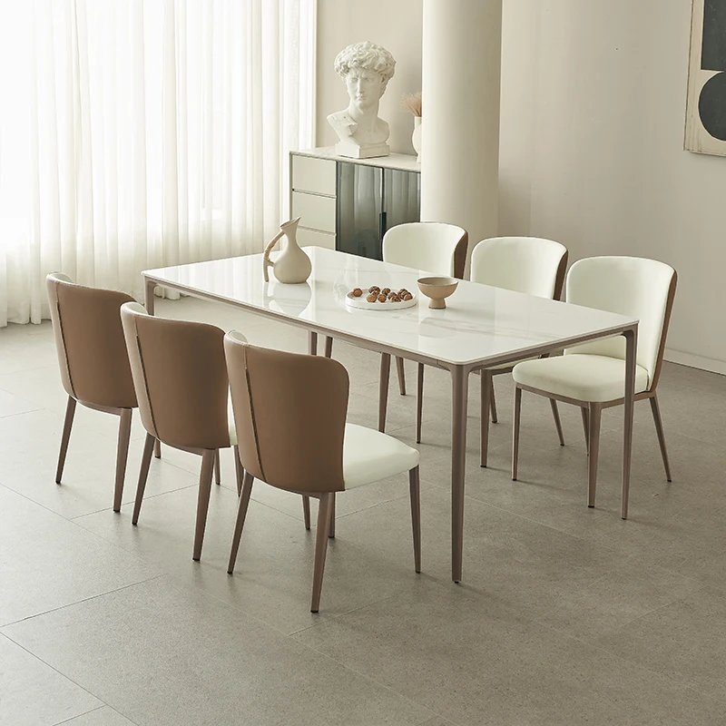 Italian minimalist light luxury rock plate dining table and chair combination modern household rectangular dining table 
Italian minimalist light luxury rock plate dining table and chair combination modern household rectangular dining table