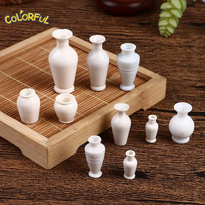 5Pcs/set 1:12 Dollhouse Miniature Flower Vase White Flowerpot Simulation Vase Pot Model Furniture Doll House Decor Accessories
5Pcs/set 1:12 Dollhouse Miniature Flower Vase White Flowerpot Simulation Vase Pot Model Furniture Doll House Decor Accessories