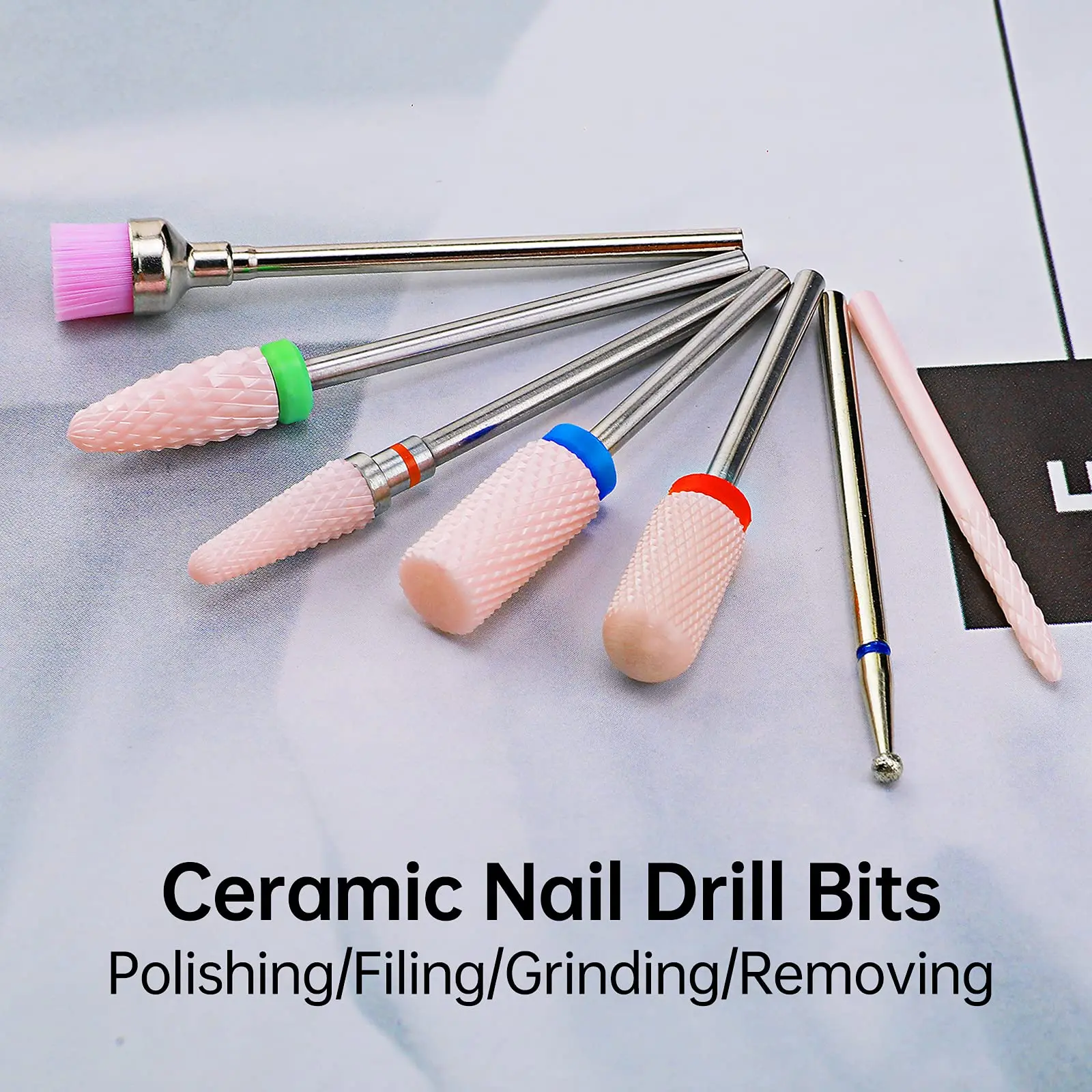 7PCS Ceramic Nail Drill Bits Set Carbide Drill Bit 3/32’’ for Acrylic Nails Cuticle Gels with Nail Bits Holder Package 
7PCS Ceramic Nail Drill Bits Set Carbide Drill Bit 3/32’’ for Acrylic Nails Cuticle Gels with Nail Bits Holder Package