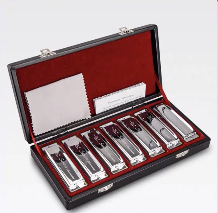 Chinese musical instrument cheap price 10 hole A/B/C/D/E/F/G silver harmonica musical instruments 
Chinese musical instrument cheap price 10 hole A/B/C/D/E/F/G silver harmonica musical instruments