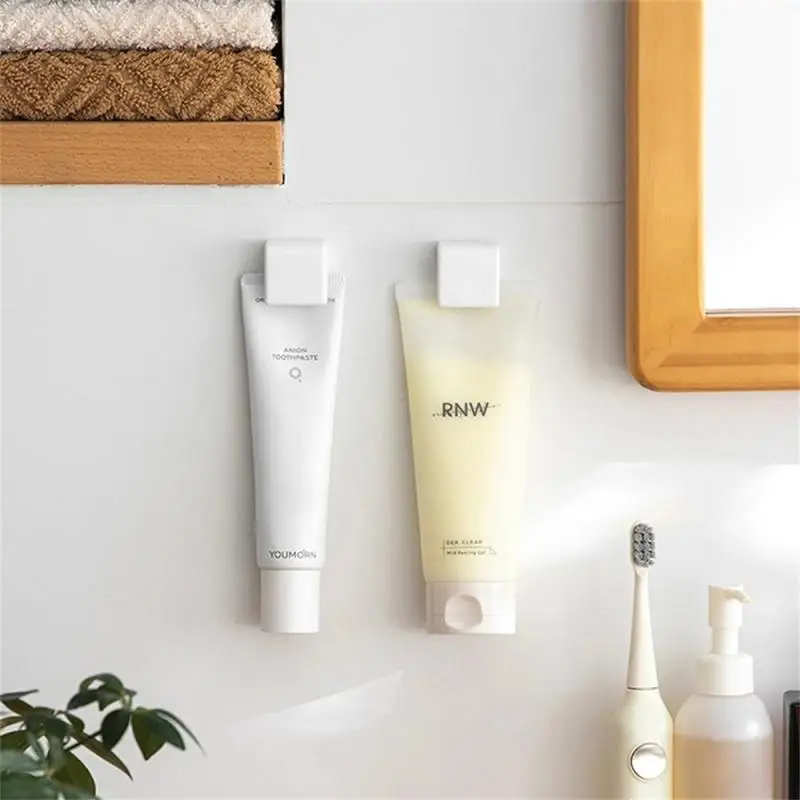 Multifunctional Toothpaste Storage Rack Bathroom Toothpaste Holder Wall Hanger Adhesive Facial Cleanser Clip Bathroom Accessory
Multifunctional Toothpaste Storage Rack Bathroom Toothpaste Holder Wall Hanger Adhesive Facial Cleanser Clip Bathroom Accessory