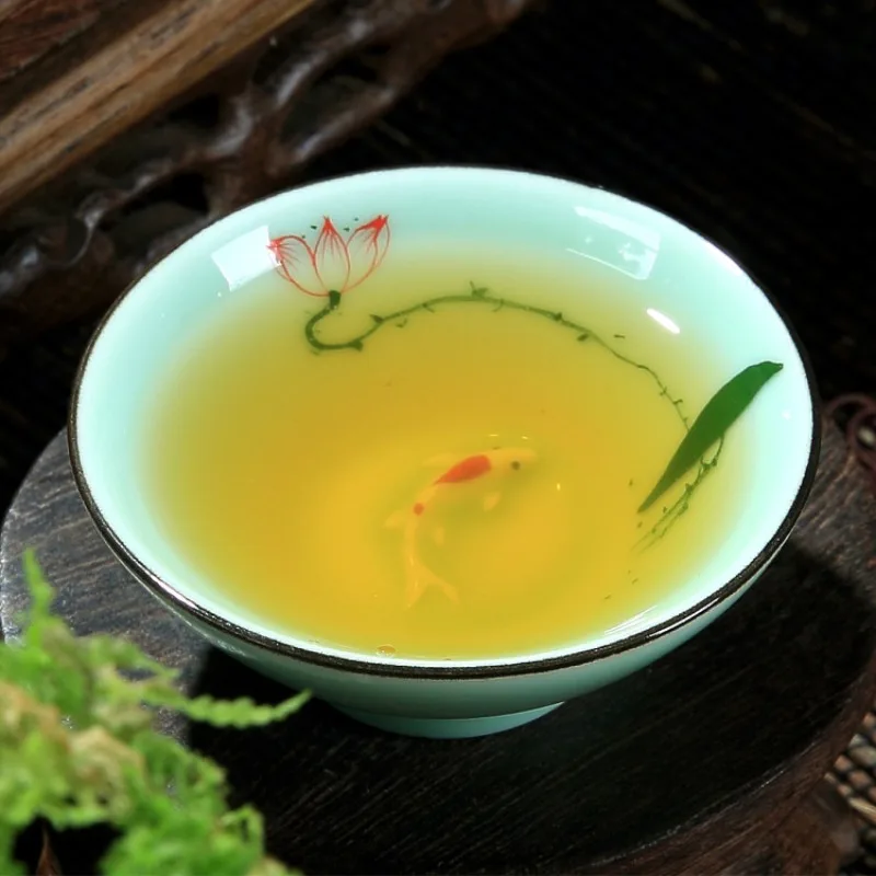 55ml Creative Ceramic Celadon Kung Fu Teacups Embossed Singer Carp Hand Painted Pu'er Tea Cup Hat Drinking Cups
55ml Creative Ceramic Celadon Kung Fu Teacups Embossed Singer Carp Hand Painted Pu'er Tea Cup Hat Drinking Cups