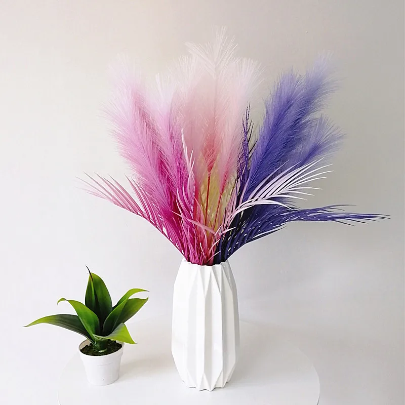 70CM 8 Artificial Reed Grass Simulation Wedding Flower Fake Feather Plastic Onion Grass Wedding Hotel Home Party Deco Accessori
70CM 8 Artificial Reed Grass Simulation Wedding Flower Fake Feather Plastic Onion Grass Wedding Hotel Home Party Deco Accessori