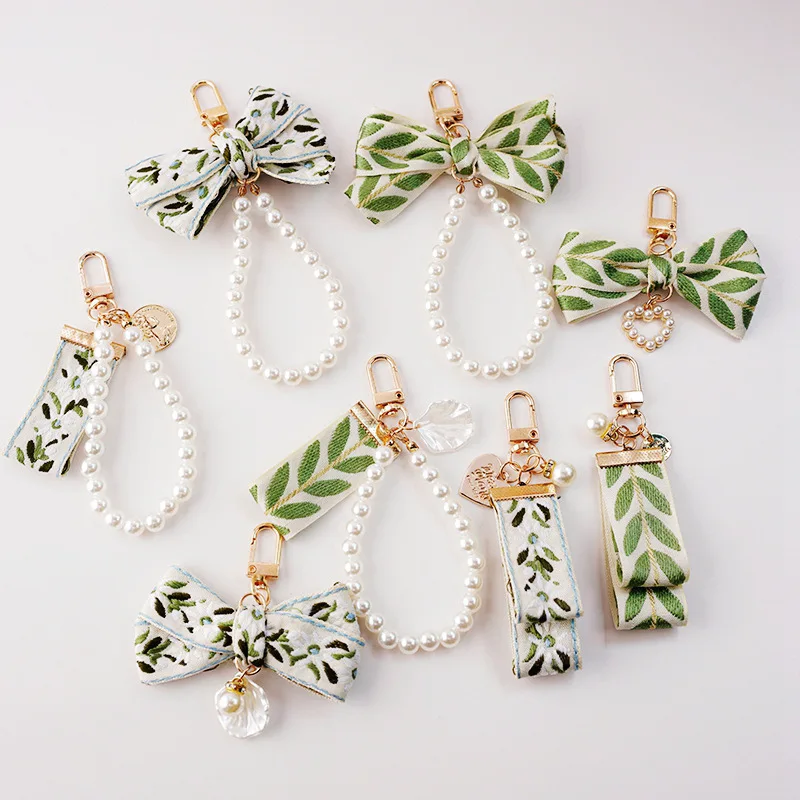 Braid Green Bow Knot Fabric Ins Wind Fragmented Flower Embroidery Pearl Girl Cute Schoolbag Pendant Small Fresh Keychain
Braid Green Bow Knot Fabric Ins Wind Fragmented Flower Embroidery Pearl Girl Cute Schoolbag Pendant Small Fresh Keychain